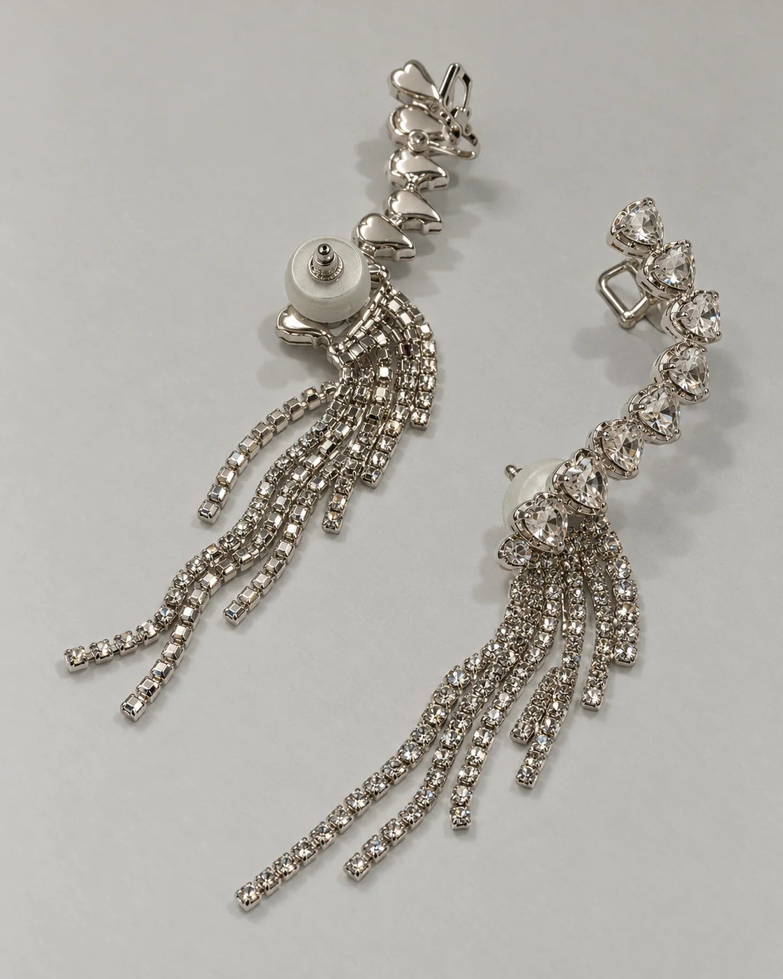 Back view of the silver heart ear climbers showing post backs and upper ear clips