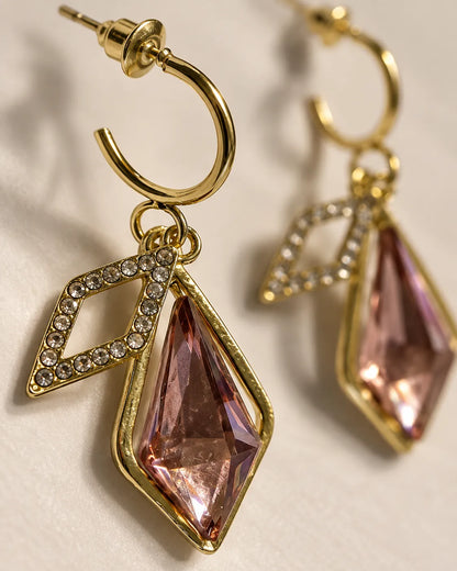 Close-up of the pavé rhombus frame and faceted rose-pink crystal