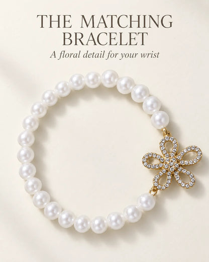 Pearl-look bead bracelet with a gold crystal flower and The Matching Bracelet text