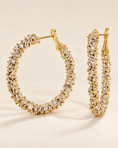 Gold crystal cluster hoops shown from the front and the side