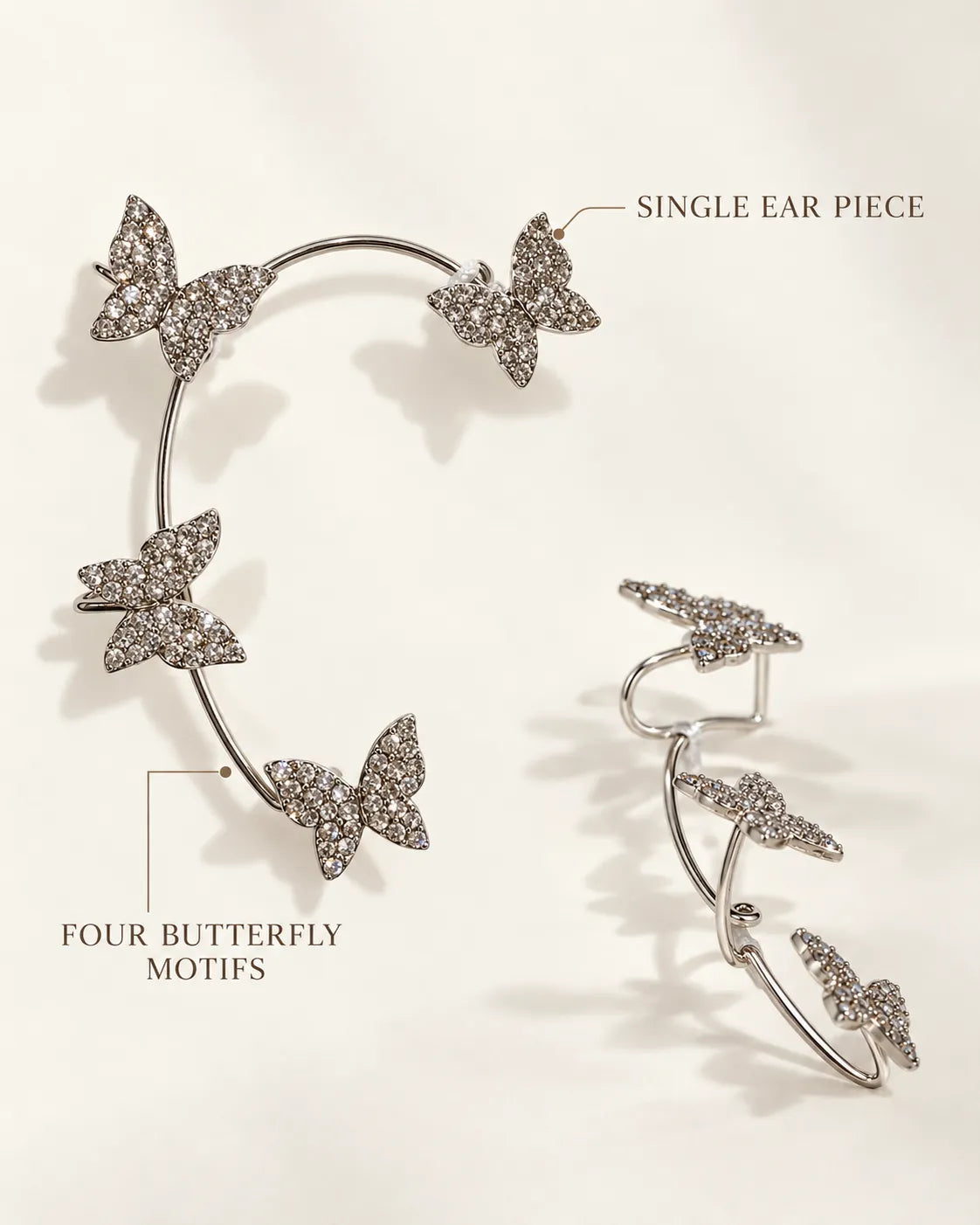 Graphic of the single silver butterfly ear cuff with four butterfly motifs