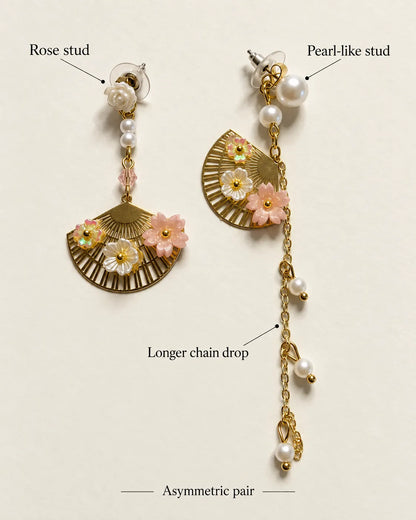 Annotated graphic of the asymmetric pair showing the rose stud, pearl-look stud and chain