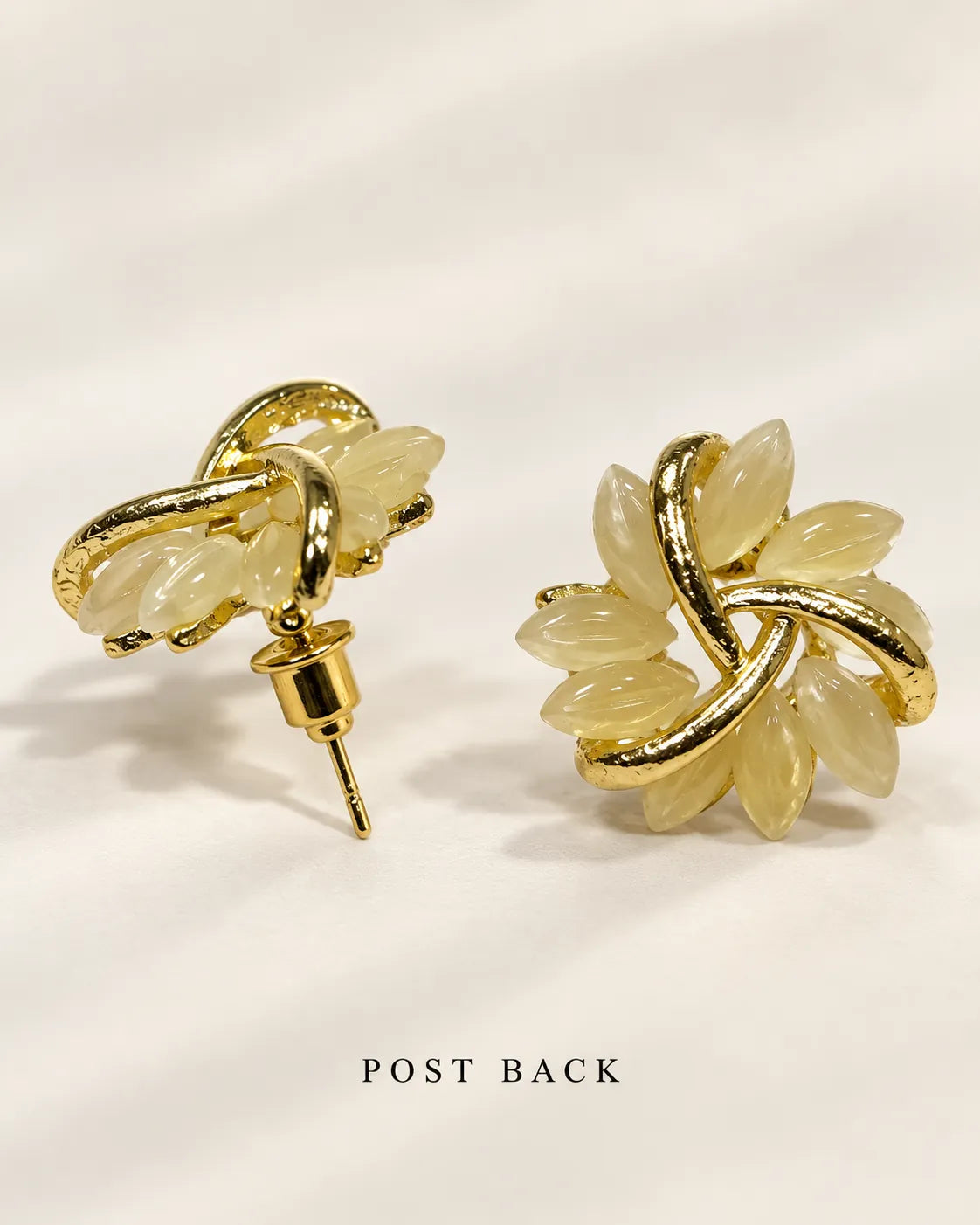 Gold opal flower studs on cream card showing the front and post back