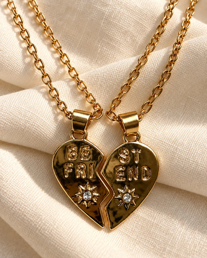 Gold BE FRI and ST END heart halves on soft cream fabric