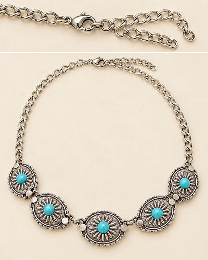 Flat lay of the antique silver turquoise choker showing the extender chain