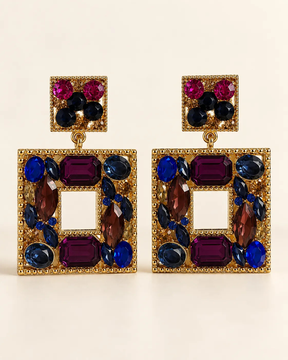 Celeste plum crystal square drop statement earrings on a cream background