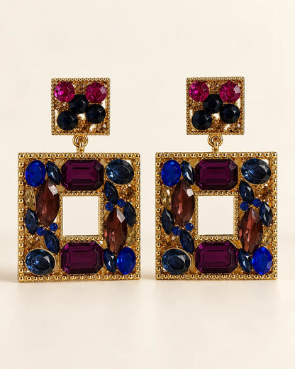 Celeste plum crystal square drop statement earrings on a cream background