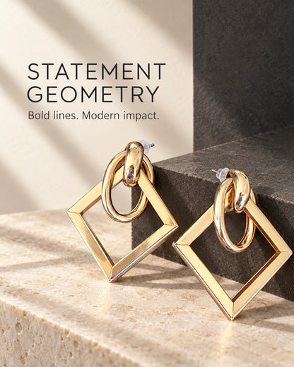 Statement geometry graphic of the gold square drop earrings