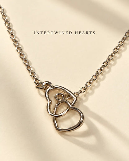 Silver interlinked hearts necklace with Intertwined Hearts text
