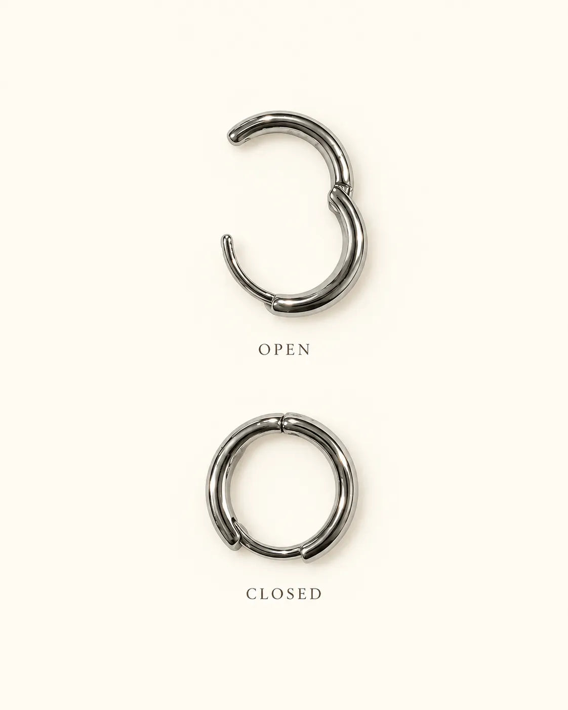 Graphic of a silver huggie hoop shown open and closed