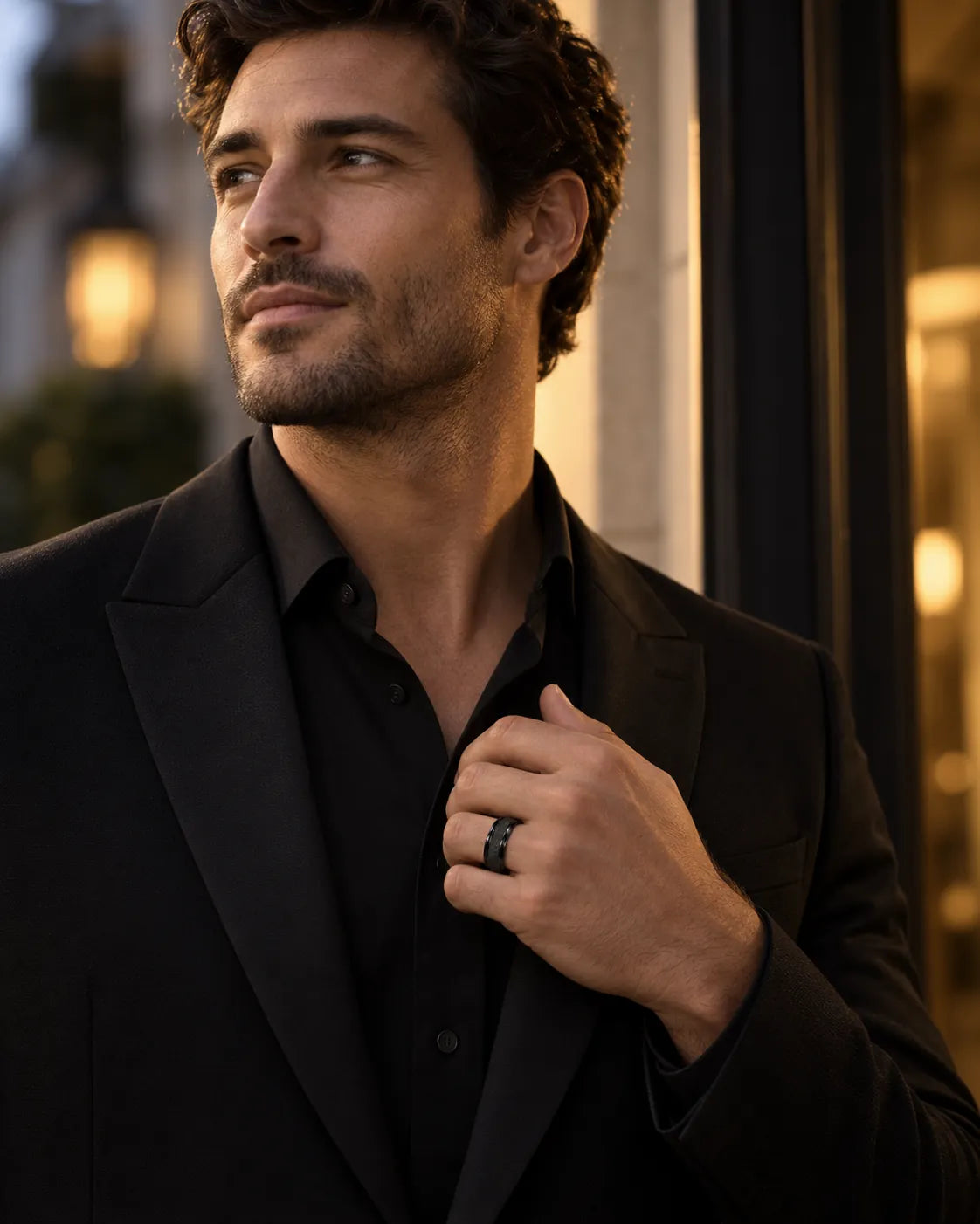 Man in dark evening clothes wearing the black textured band ring