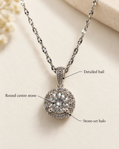 Luna feature card highlighting the detailed bail, round centre stone and stone-set halo
