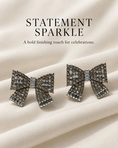 Statement sparkle graphic of the clear rhinestone bow stud earrings