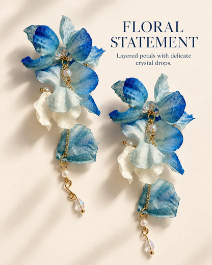 Floral statement graphic of the blue fabric petal earrings