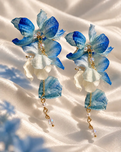 Blue and white fabric flower earrings with crystal drops on satin
