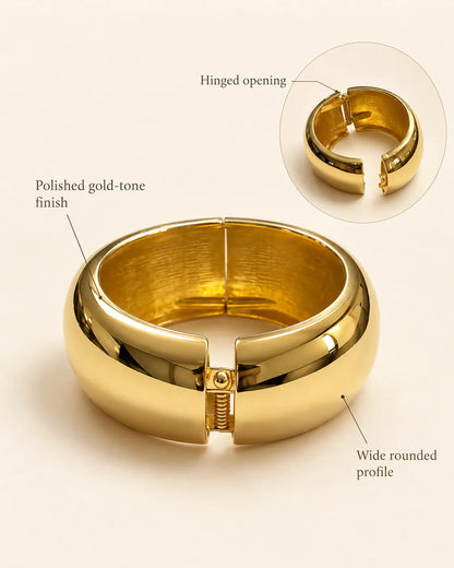 Annotated graphic of the gold cuff showing hinged opening and wide rounded profile