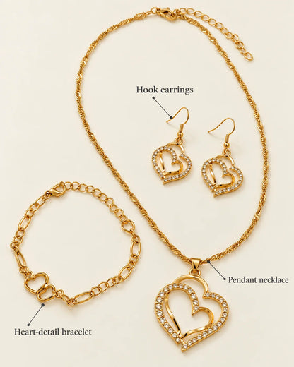 Gold heart jewellery set showing hook earrings, pendant necklace and heart-detail bracelet