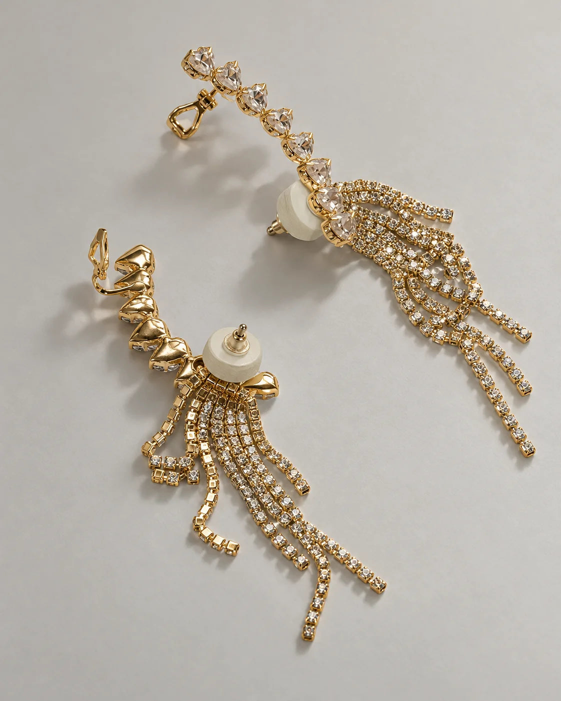 Back view of the gold heart ear climbers showing post backs and upper ear clips
