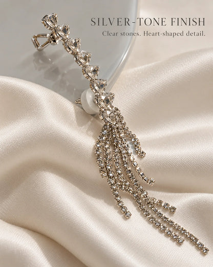 Silver-tone finish ear climber with clear heart-shaped stones on ivory satin