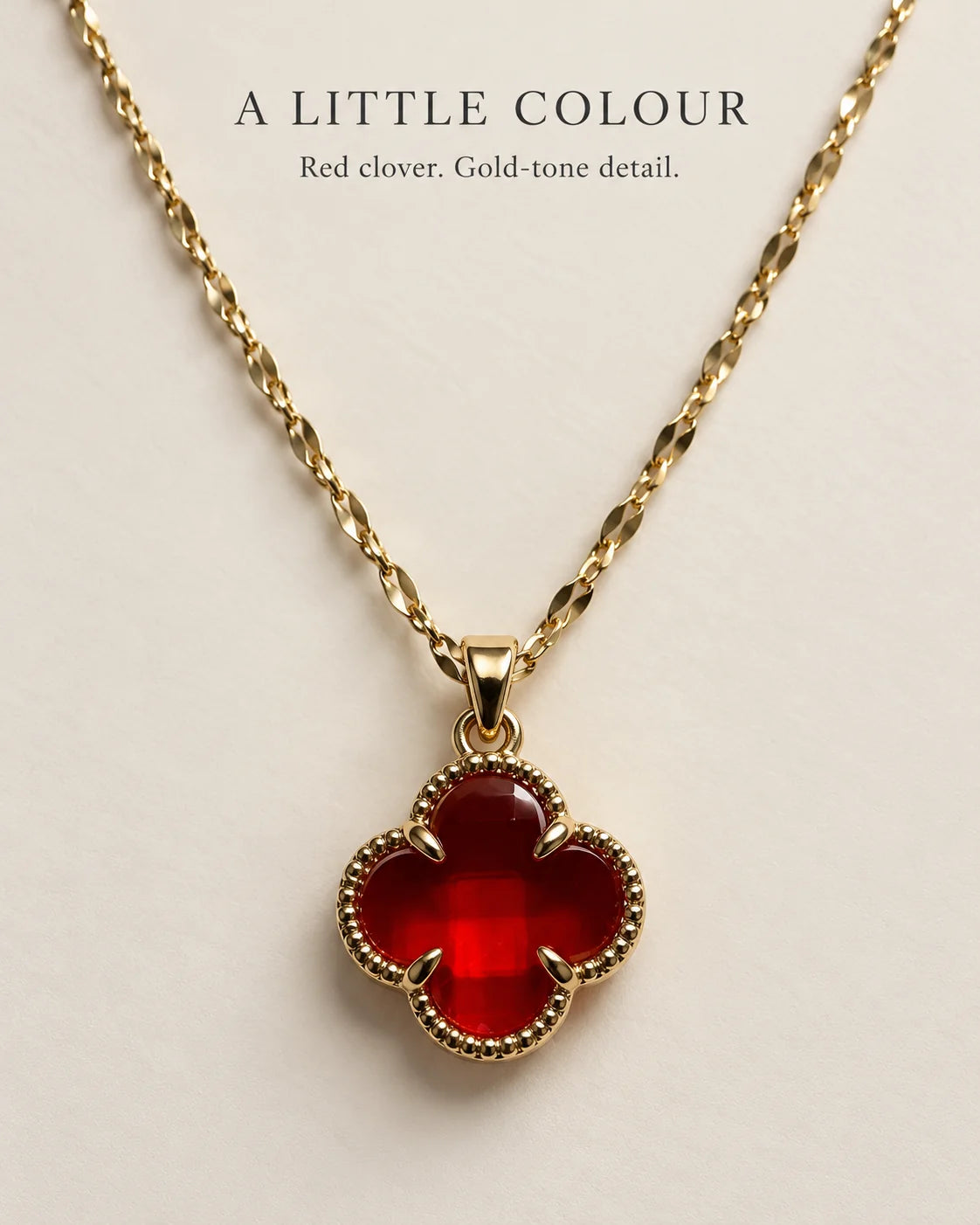 A little colour: Fortuna cherry red clover pendant necklace feature card