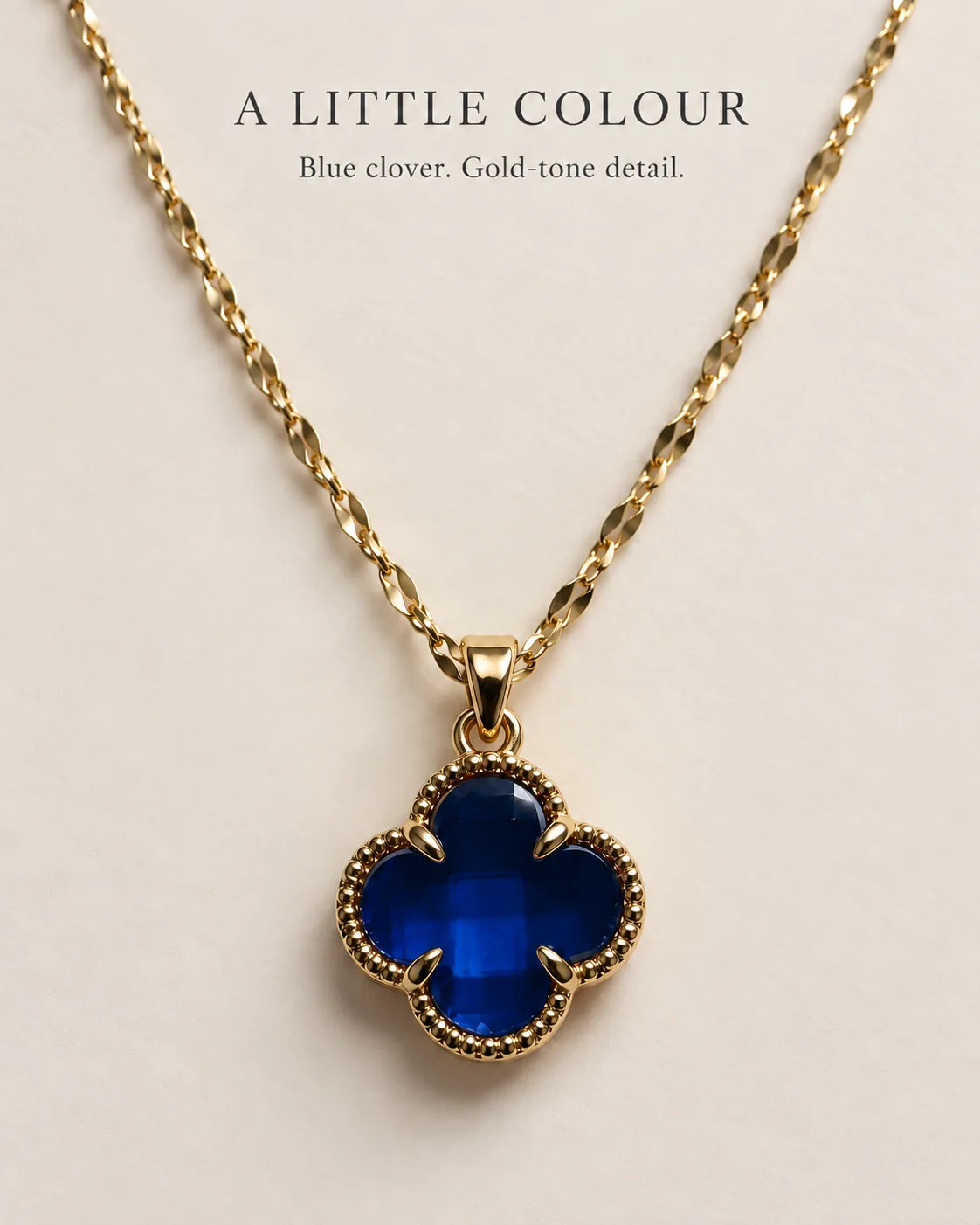 A little colour: Fortuna sapphire blue clover pendant necklace feature card