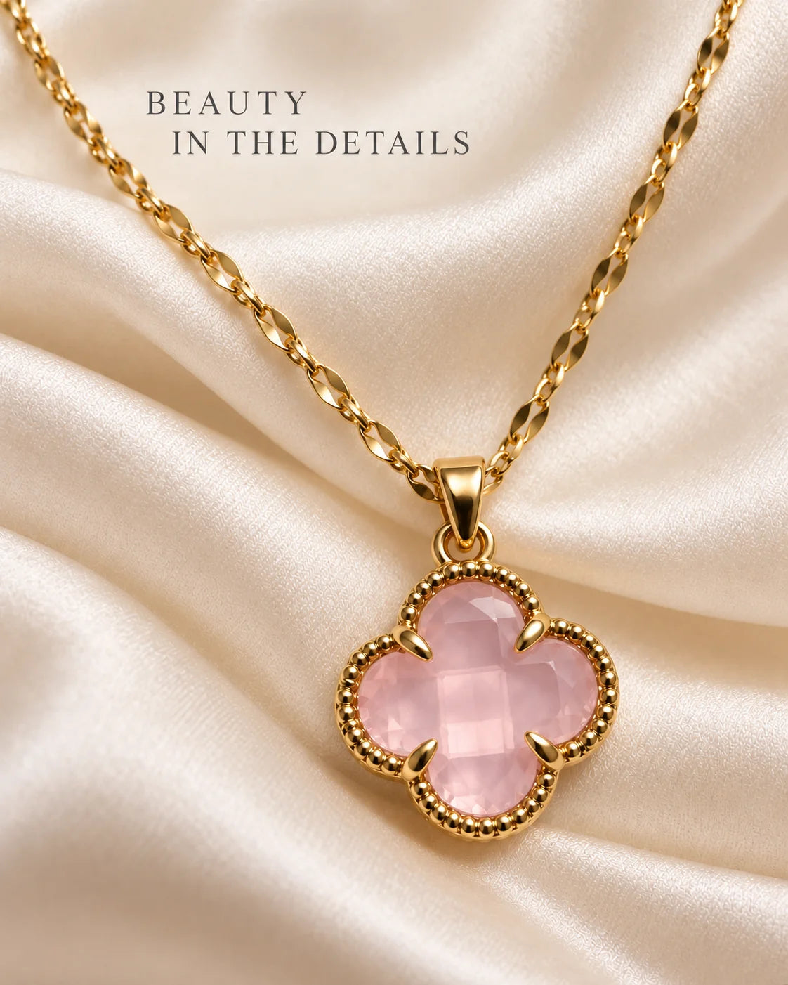 Beauty in the details: Fortuna baby pink clover pendant on ivory satin